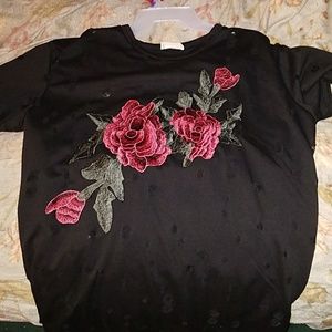 a rose detailed black distressed shirt
